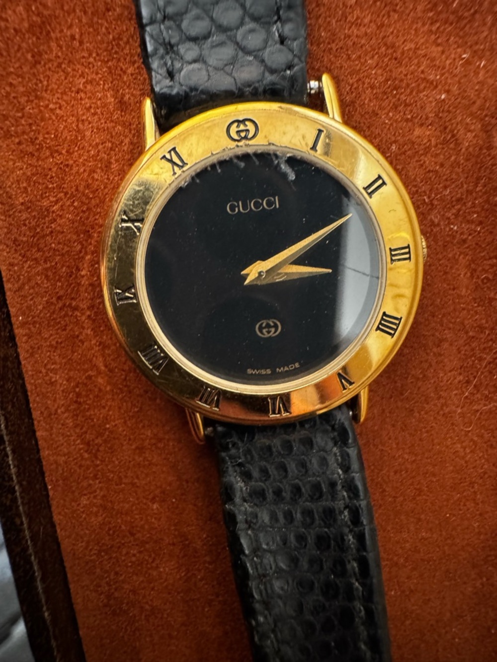 Black and Gold Round Dial Leather Watch